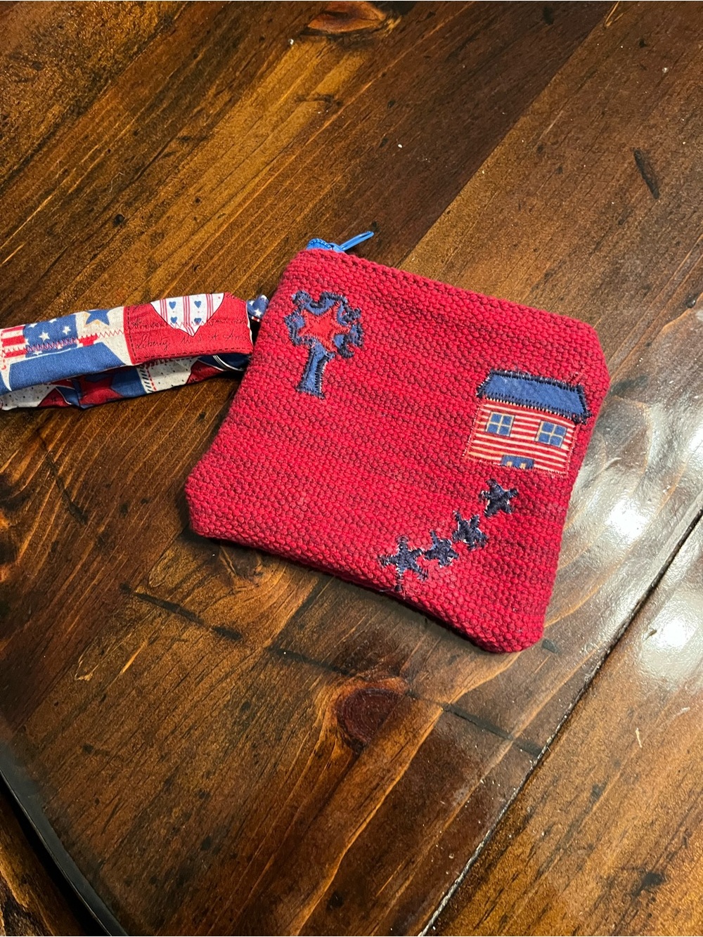 Red burlap Wristlet Clutch with Embroidered Stars & House